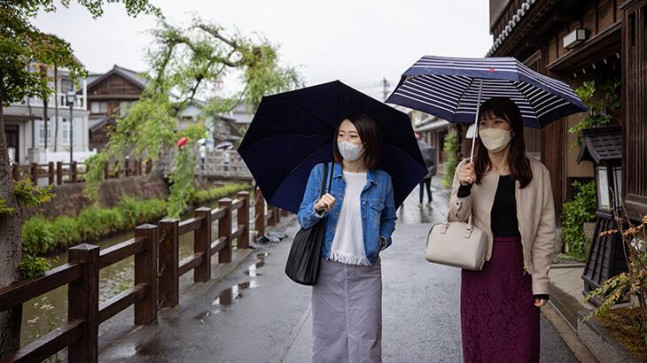 Japonya’da maske kullanımı kişisel tercihe bırakıldı